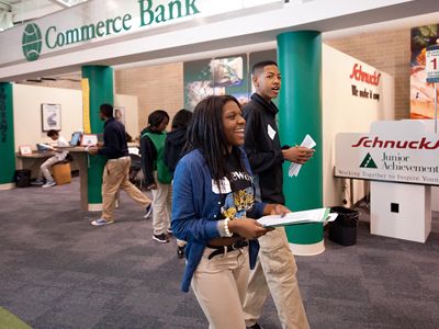 Volunteers and Students in a JA Finance Park or JA BizTown